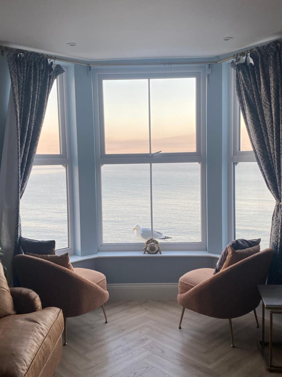 Natural landscape, Living room, Seating area, Sea view