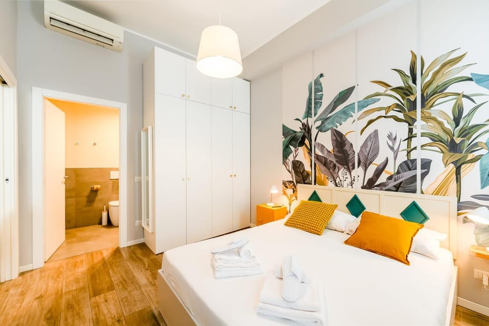 Bed, Living room, Photo of the whole room, Seating area, Bedroom, towels, wardrobe, air conditioner