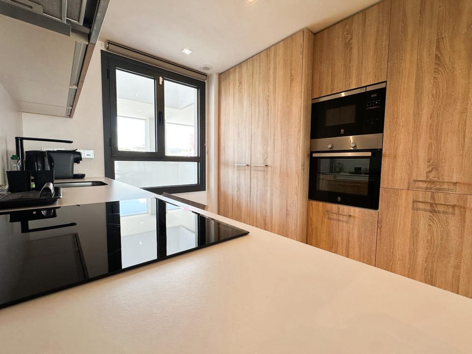 Kitchen or kitchenette, oven, stove
