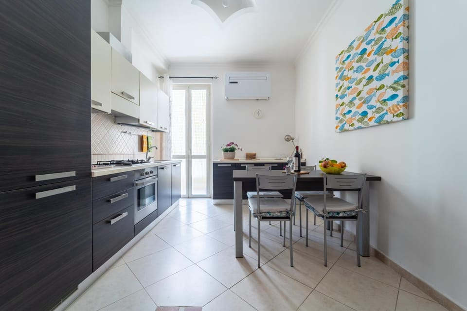 Kitchen or kitchenette, Living room, Seating area, Dining area, air conditioner