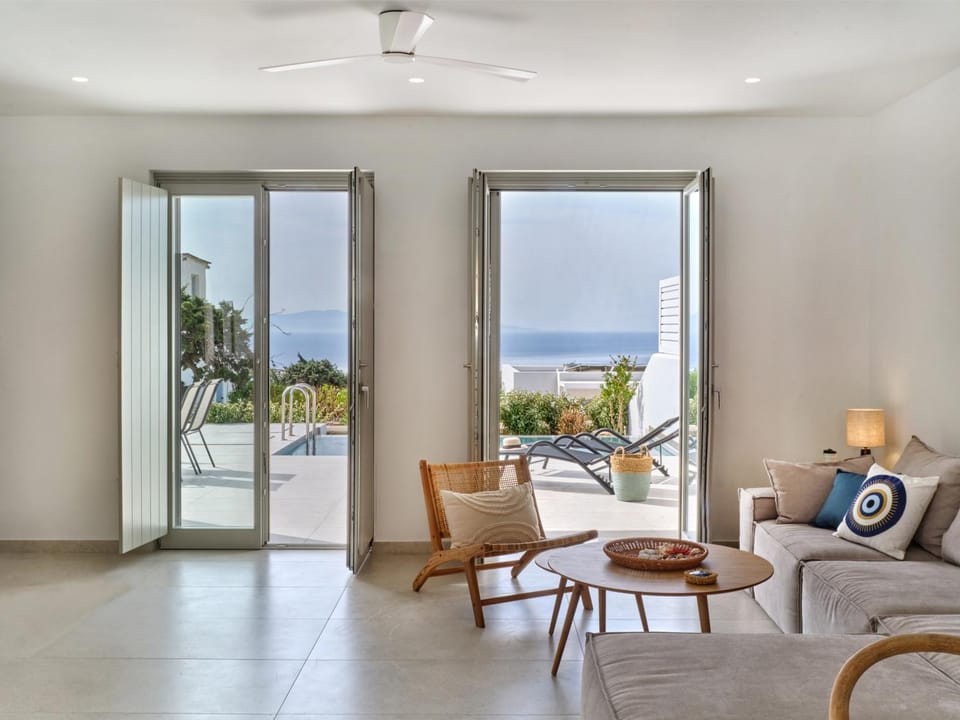 Natural landscape, View (from property/room), Living room, Seating area, Sea view