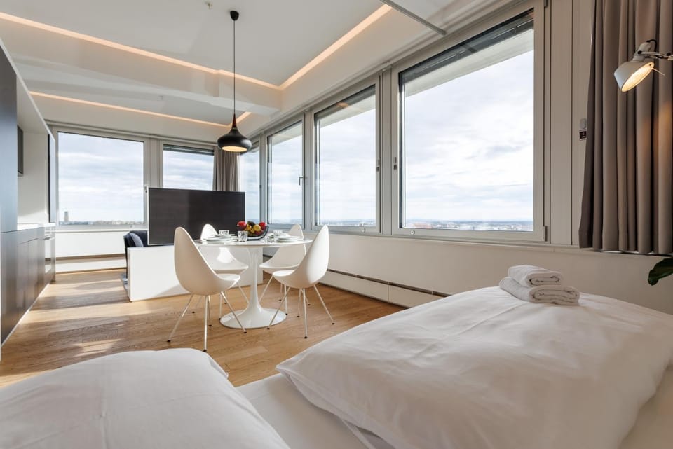 Bed, Living room, Seating area, Bedroom