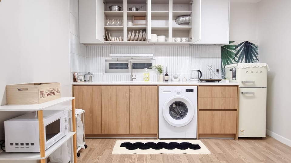 Kitchen or kitchenette, washing machine