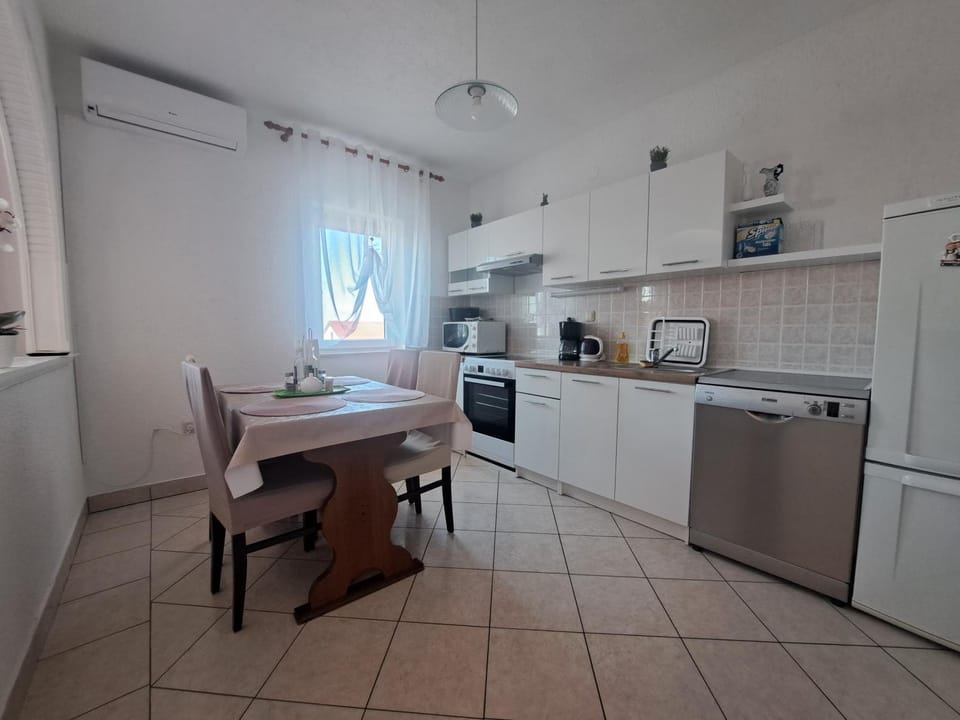 Dining area, dishwasher, microwave, stove, kitchen