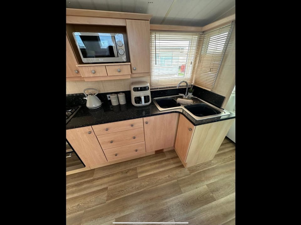 Kitchen or kitchenette, oven, stove