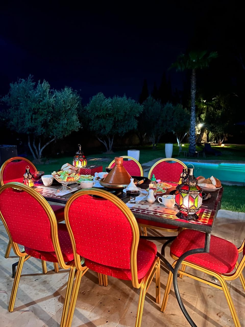 Patio, Night, Dining area, Pool view, Swimming pool, sunbed