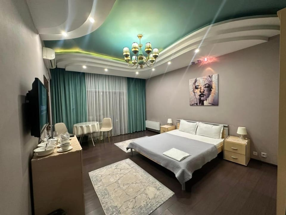Bed, TV and multimedia, Living room, Photo of the whole room, towels