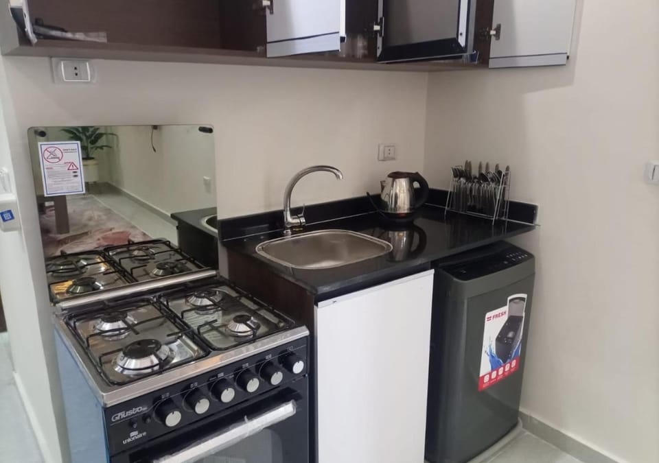 Kitchen or kitchenette, stove
