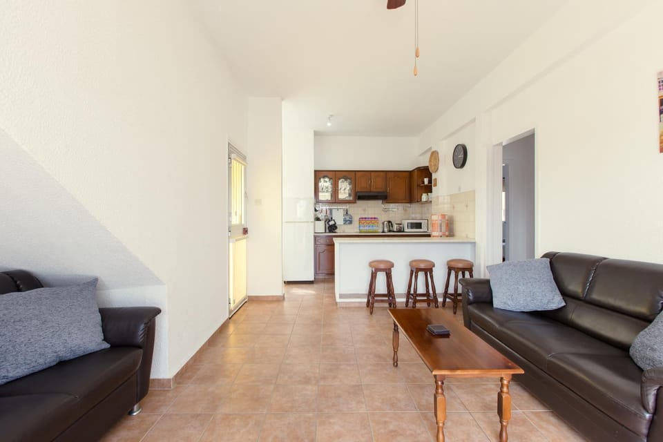 Living room, Seating area, Dining area, microwave, oven, stove