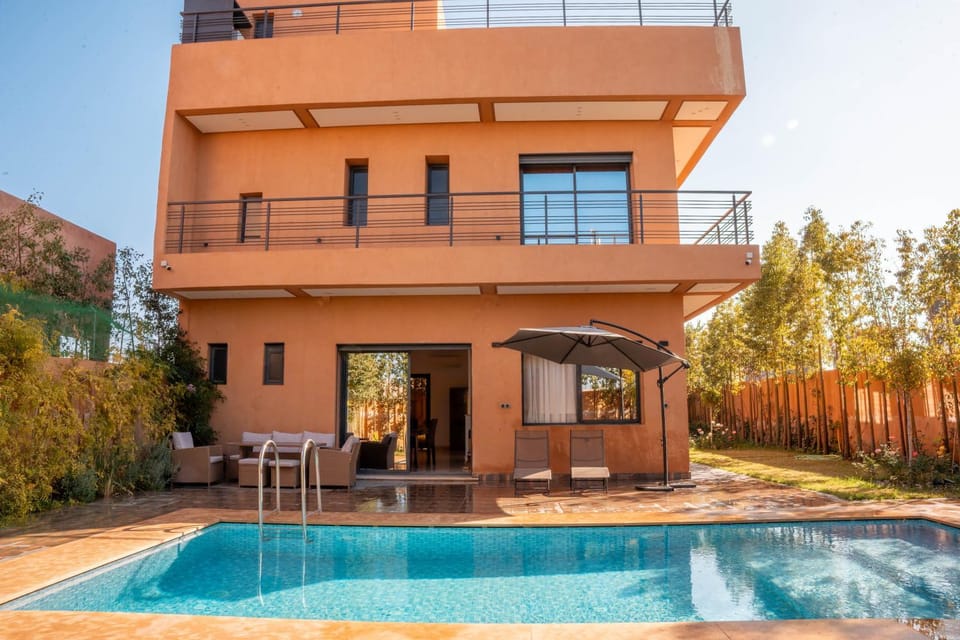 Property building, Day, Pool view, sunbed
