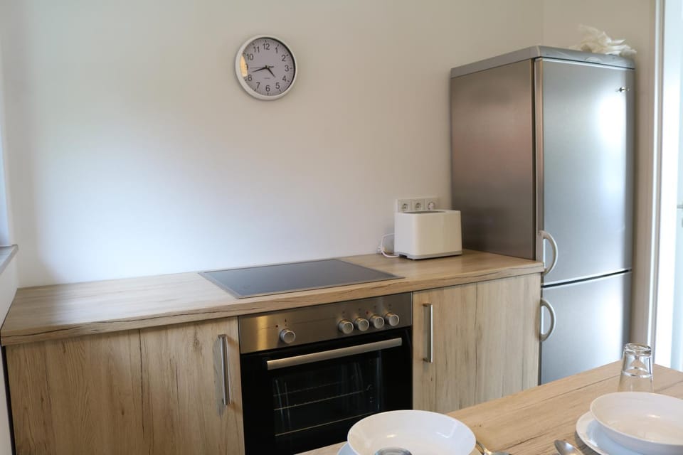 Kitchen or kitchenette, oven, stove, toaster