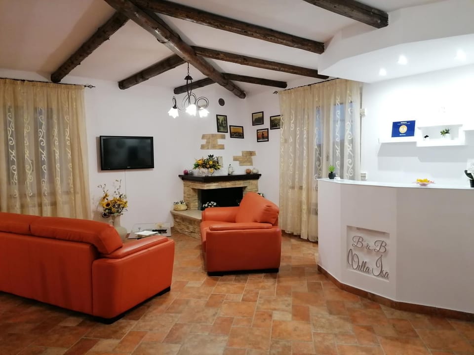 Communal lounge/ TV room, Property logo or sign, Lobby or reception