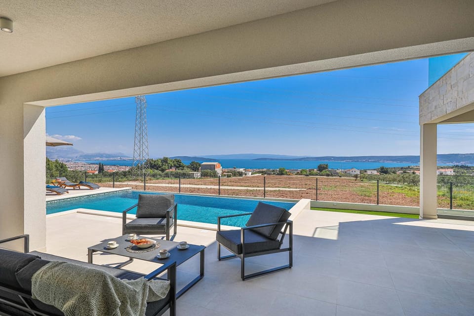 View (from property/room), Seating area, Pool view, Swimming pool, sunbed