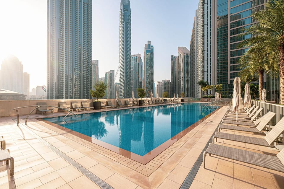 Property building, Day, Pool view, Swimming pool, sunbed