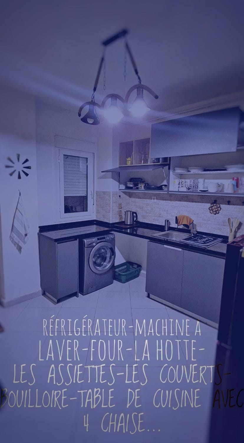 Kitchen or kitchenette, stove, washing machine