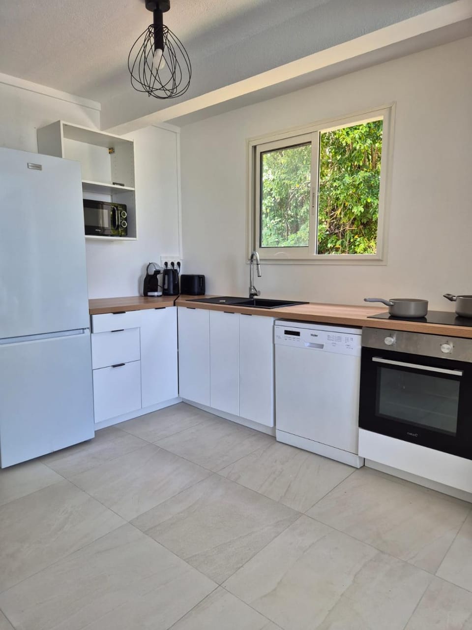 Kitchen or kitchenette, dishwasher, oven, stove, toaster