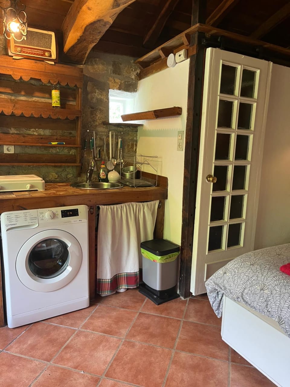 Kitchen or kitchenette, washing machine