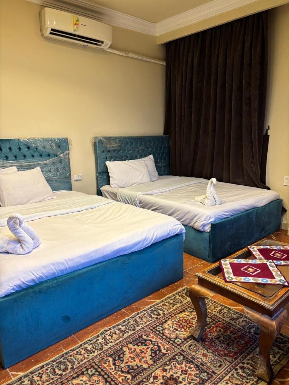 Bed, Photo of the whole room, Bedroom, towels, air conditioner