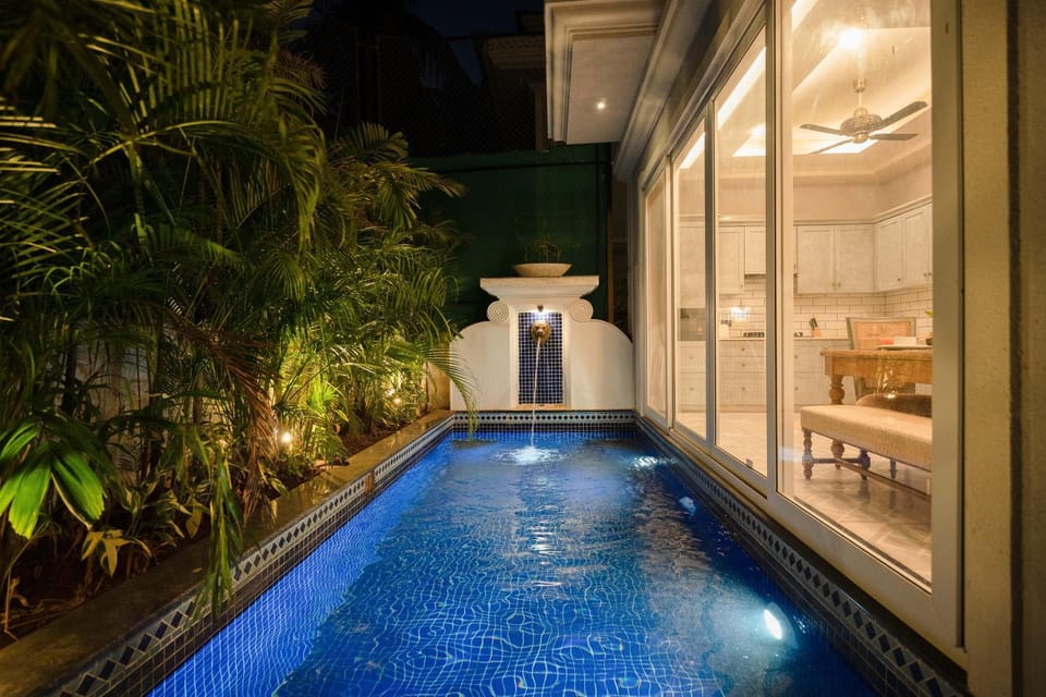 Patio, Night, Pool view, Swimming pool, sunbed