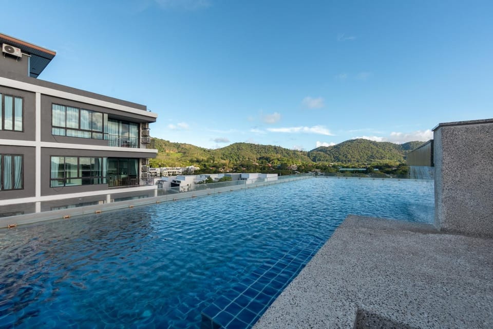 Property building, Nearby landmark, Day, Pool view, Swimming pool