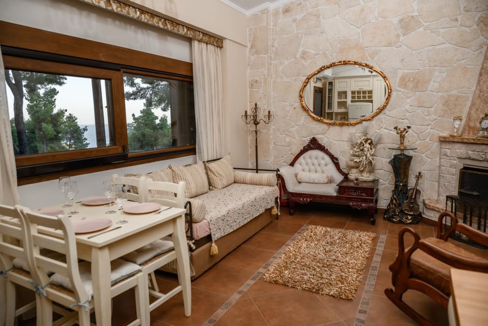 Property building, Summer, View (from property/room), View (from property/room), Living room, Garden view, Garden view, Sea view, Sea view, fireplace, fireplace