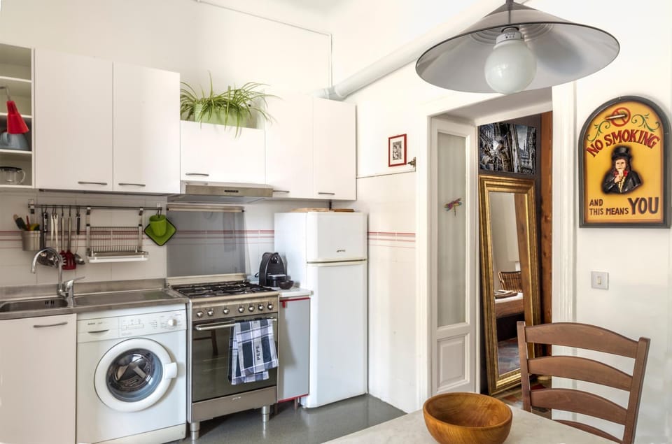 Kitchen or kitchenette, washing machine