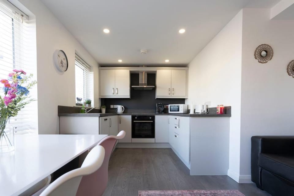 Kitchen or kitchenette, Dining area, dishwasher, oven, stove, toaster