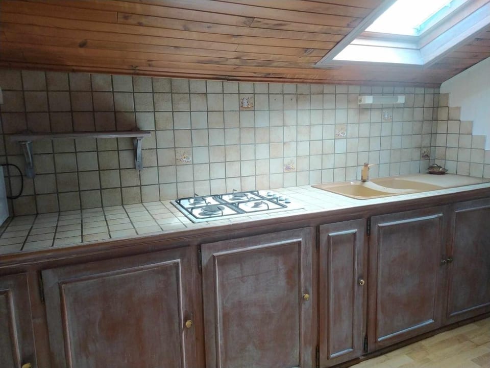 Kitchen or kitchenette, stove
