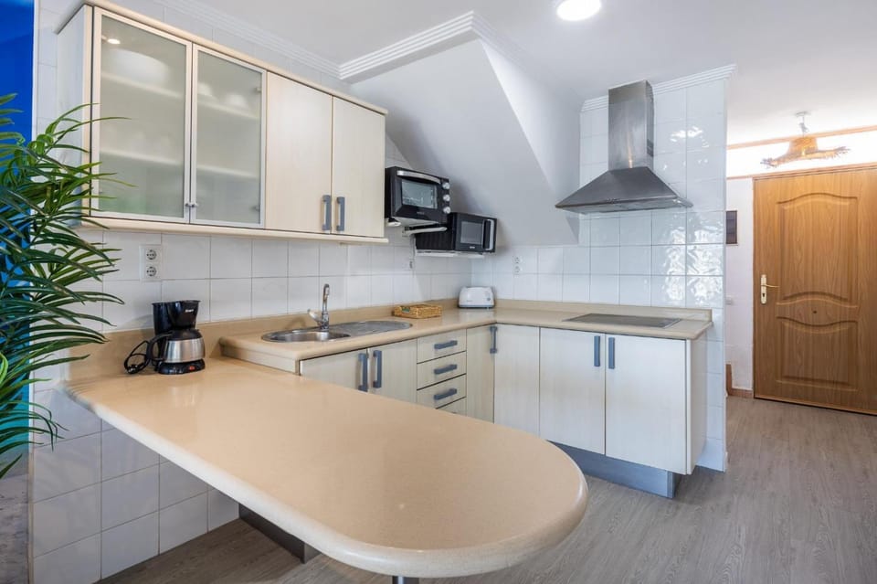 Kitchen or kitchenette, stove