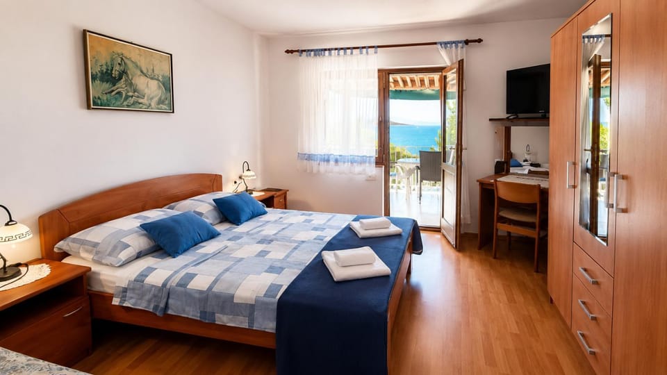 Bed, Natural landscape, TV and multimedia, Bedroom, towels, wardrobe