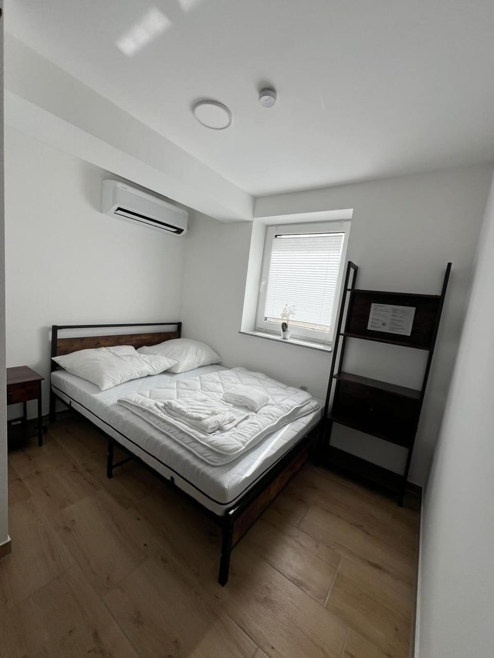 Bed, Photo of the whole room, Bedroom, towels, air conditioner