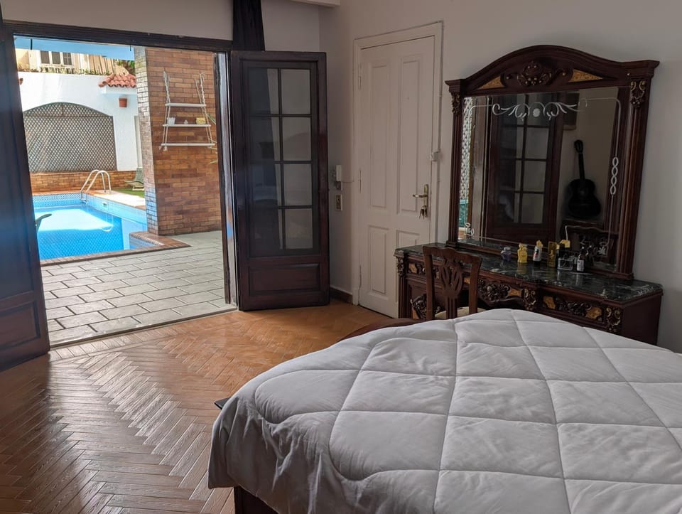 Bed, Photo of the whole room, Bedroom, Pool view, Swimming pool