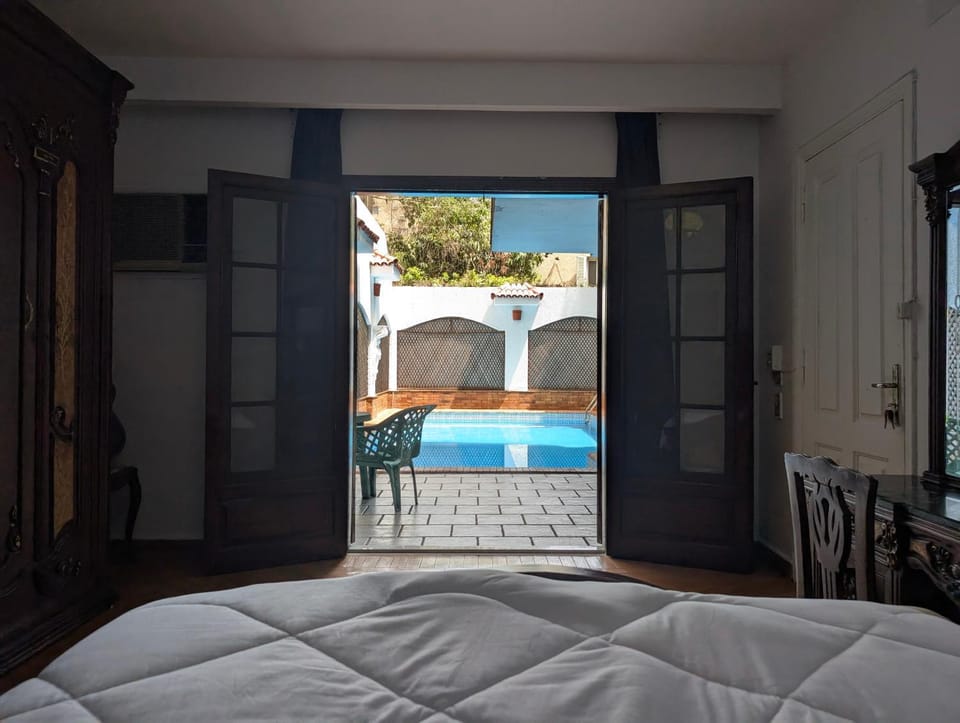 Bed, Bedroom, Pool view, Swimming pool
