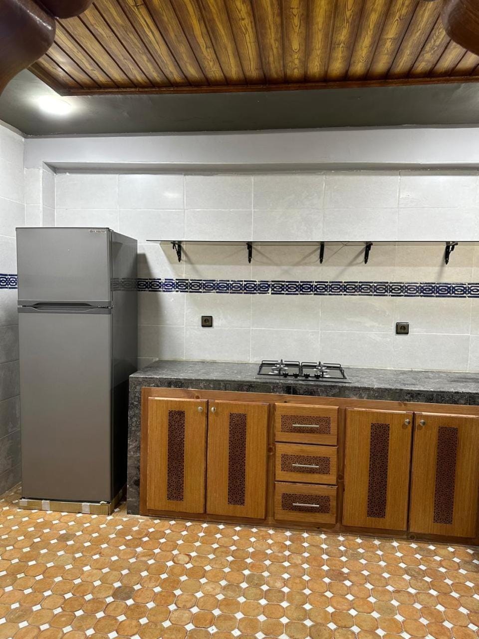 Kitchen or kitchenette, oven