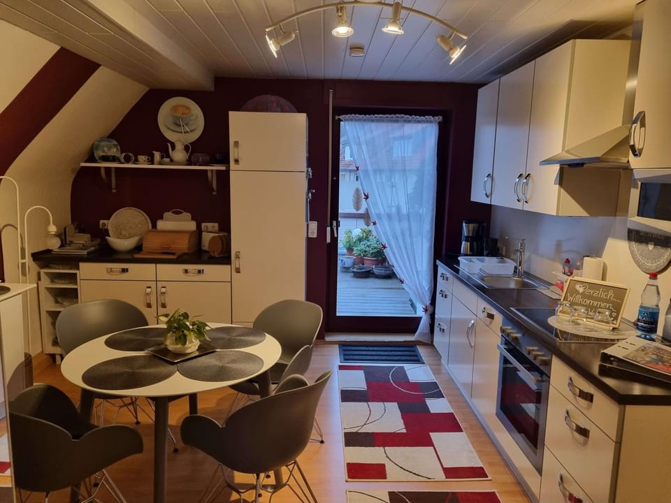Dining area, dishwasher, oven, kitchen