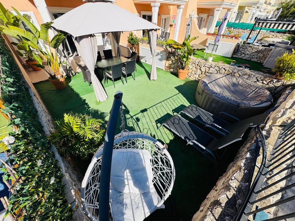 Property building, Patio, Spring, Day, Garden, View (from property/room), Garden view, sunbed