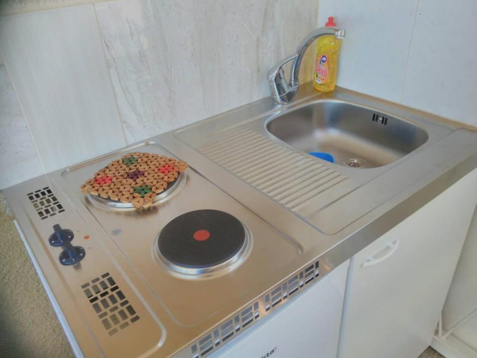 Kitchen or kitchenette, stove