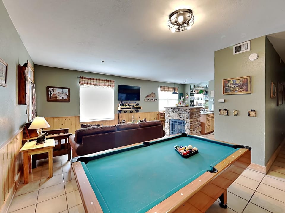 Billiard, Living room, Seating area, fireplace, furniture