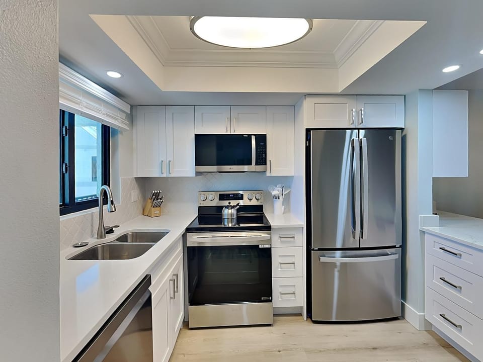 Kitchen or kitchenette, microwave, oven, stove, kitchen