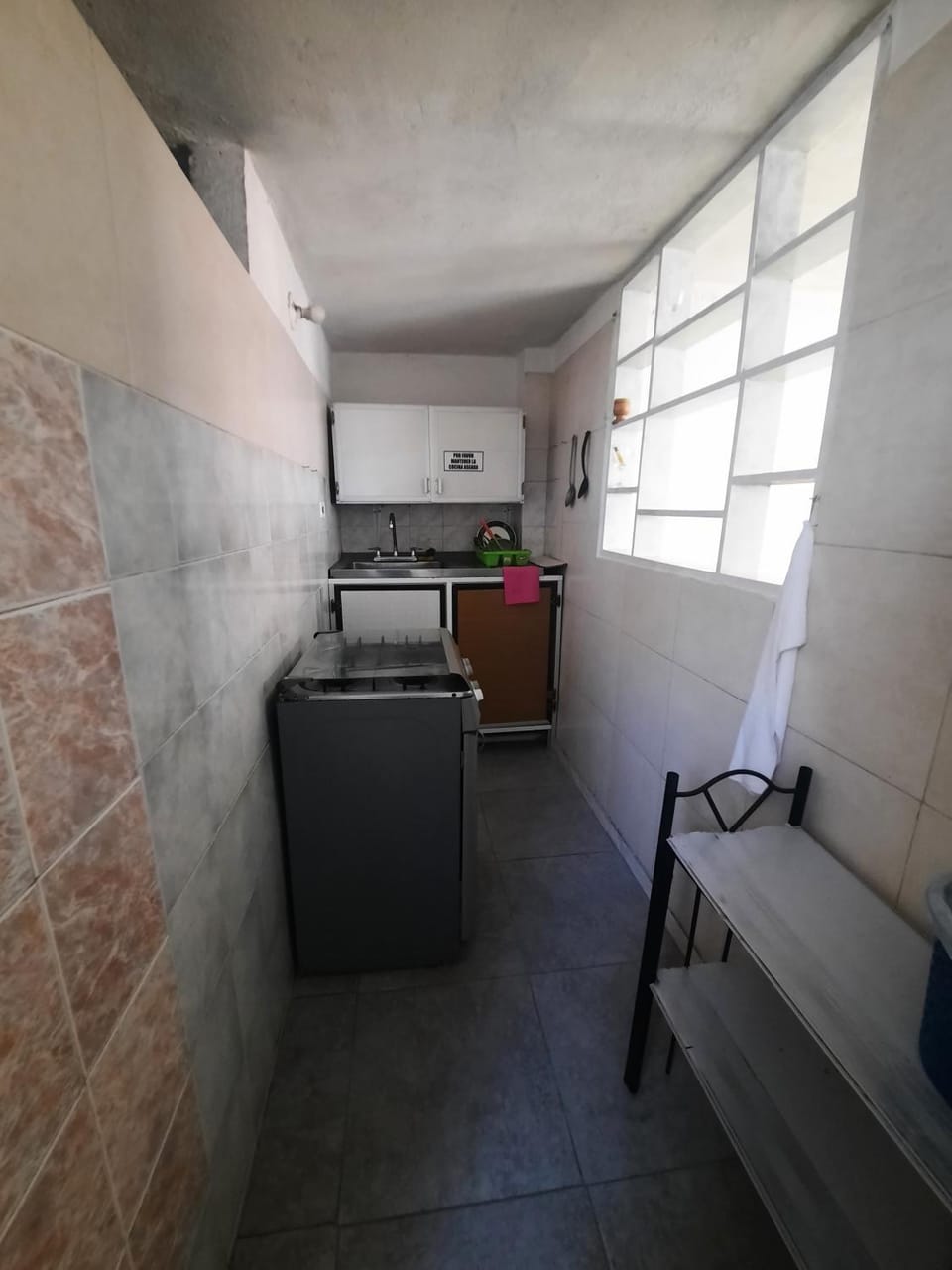 Kitchen or kitchenette, stove