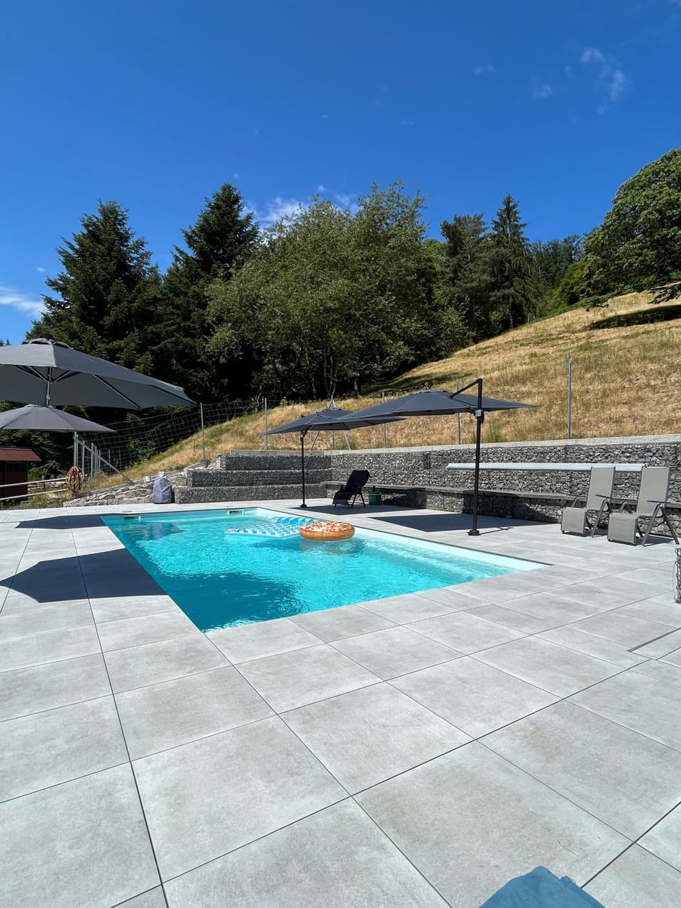 Property building, Living room, Swimming pool