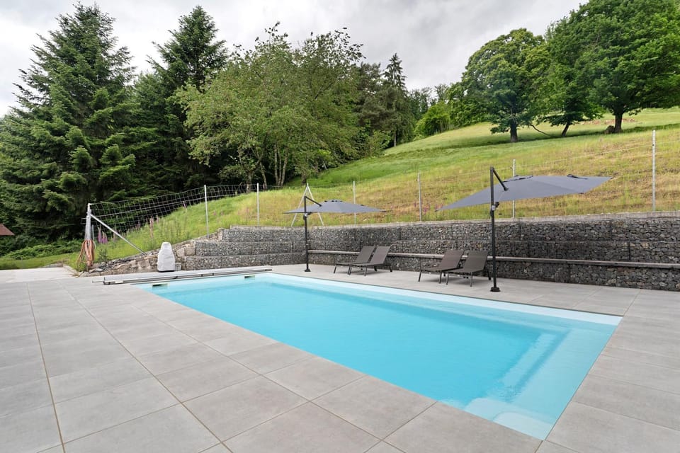 Property building, Living room, Swimming pool