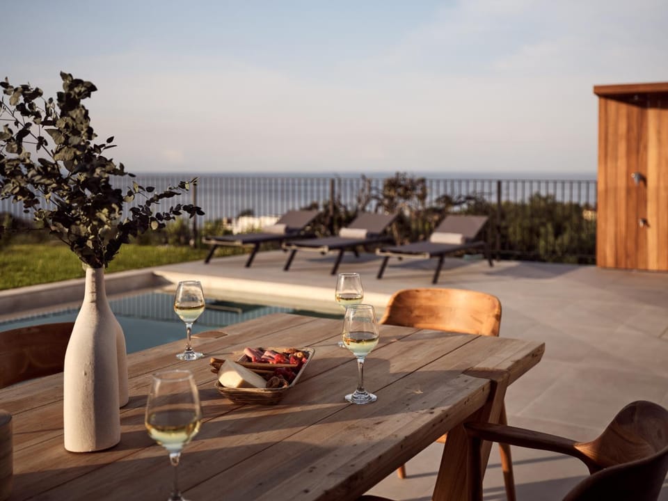 Patio, Day, View (from property/room), Seating area, Dining area, Sea view