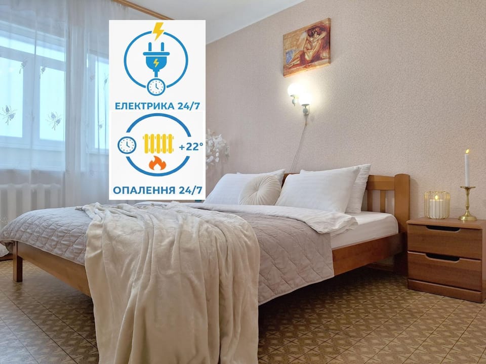 Bed, Property logo or sign, Photo of the whole room, Logo/Certificate/Sign, Bedroom, Text overlay, Certificate/Award