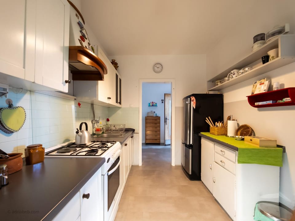 Kitchen or kitchenette, oven, stove