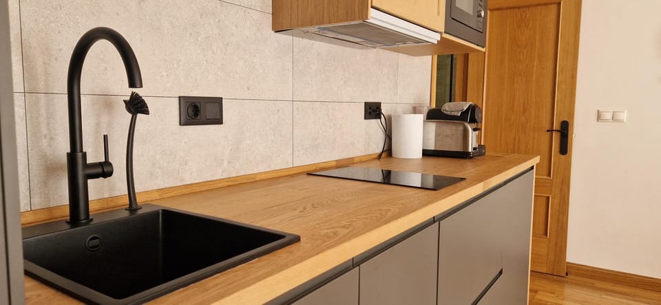 Kitchen or kitchenette, stove