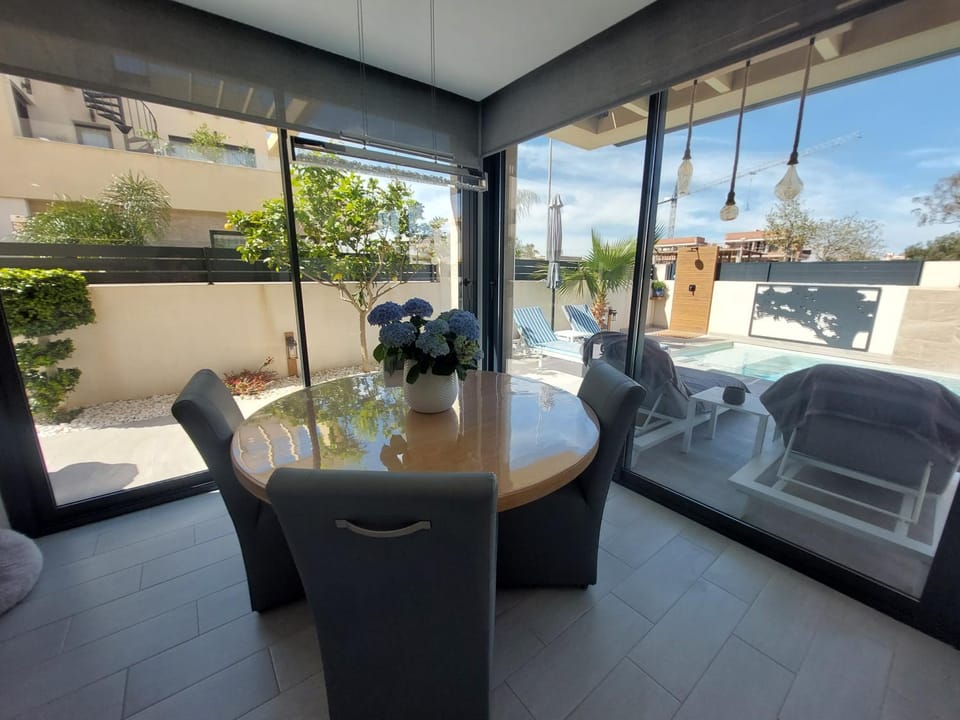 Day, View (from property/room), Living room, Seating area, Dining area