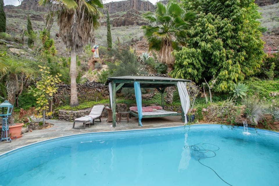 Property building, Living room, Swimming pool