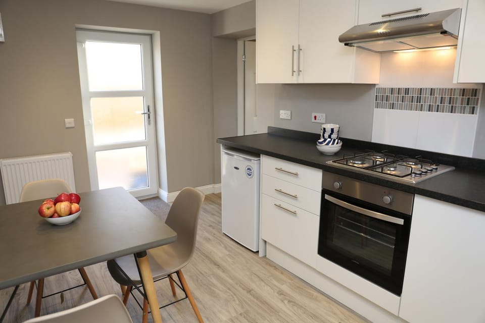 Kitchen or kitchenette, Dining area, oven, stove, toaster