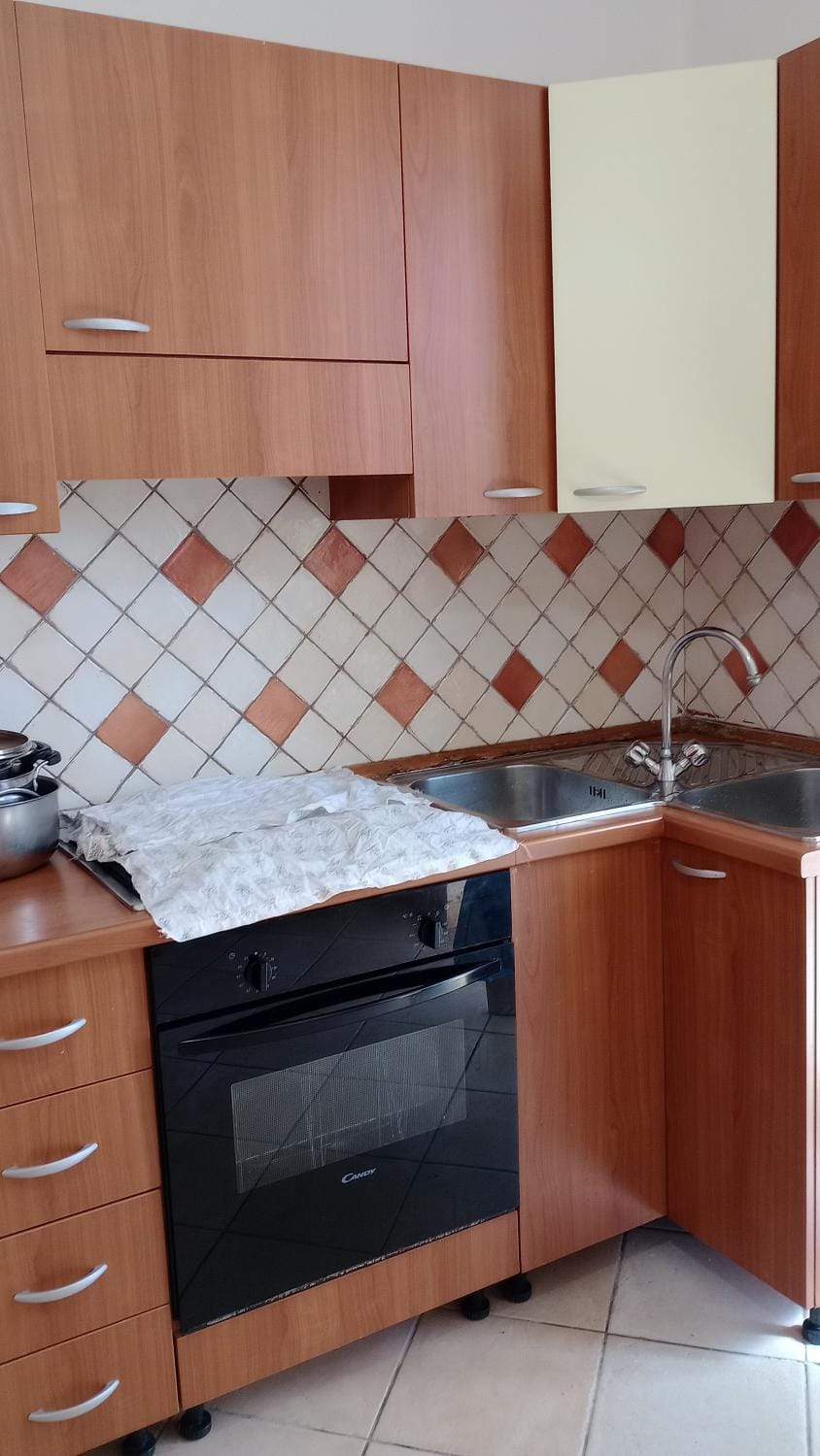 Kitchen or kitchenette, stove